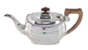 A silver faceted rectangular tea pot by J. W. Benson Ltd  A silver faceted rectangular tea pot by J.
