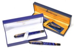 Waterman, a blue and black rollerball pen  Waterman, a blue and black rollerball pen,   with a