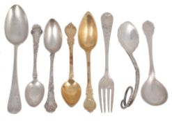 A collection of silver small flatware, including  A collection of silver small flatware,