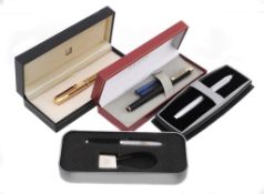 A Dunhill fountain pen, the reeded gilt cap and barrel  A Dunhill fountain pen,   the reeded gilt