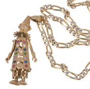 A 9 carat gold articulated clown pendant, the jacket with vari coloured...  A 9 carat gold