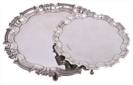 A late Edwardian silver shaped circular salver by William Hutton & Sons Ltd  A late Edwardian silver