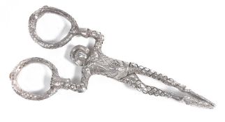 A pair of Edwardian silver Harlequin pattern sugar tongs by Charles Douglas...  A pair of