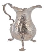 A George II or III silver baluster cream jug by Alexander Johnston, worn marks  A George II or III
