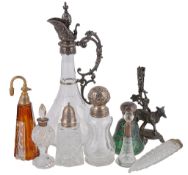 `A collection of cut glass bottles with silver and electro-plated mounts, to include: a cut glass