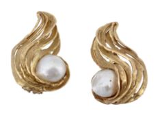 A pair of cultured pearl ear clips, the baroque cultured pearls within a scrolled textured mount,
