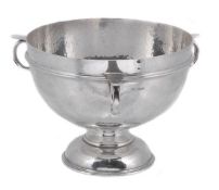 An Edwardian hammered silver three handled pedestal bowl by James Dixon & Sons Ltd, Sheffield 1909,