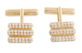 A pair of 18 carat gold and diamond cufflinks, the rectangular panels set with brilliant cut