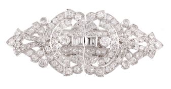 A double diamond clip brooch,  circa 1950, each clip pierced and set throughout with brilliant cut