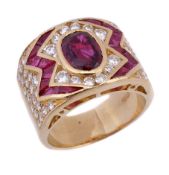 A ruby and diamond ring, the central oval shaped ruby, weighing 2.17 carats, in a collet setting
