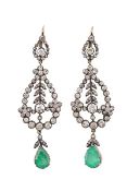 A pair of emerald and diamond ear pendents, the pear cut emerald suspended below an openwork pear