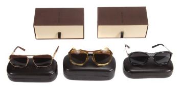 Louis Vuitton, three pairs of sunglasses,  one frame in gilt metal frame, serial number Z0259U; one