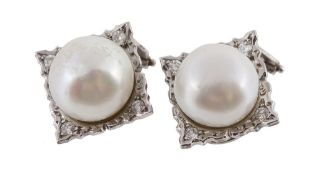 A pair of cultured pearl and diamond ear clips, the 12.2mm cultured pearl set on a square shaped