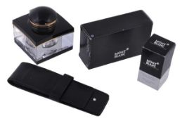 A Montblanc inkwell, the rectangular inkwell with black top an base with clear section with