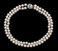 A double strand cultured pearl necklace, each strand composed of forty six and forty five 8.4mm to