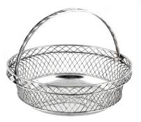 A George III silver circular bread basket by Nathaniel Smith & Co., Sheffield 1806, with a lozenge