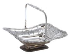 A late Victorian silver footed cake basket by James Deakin & Sons, Sheffield 1900, with a gadrooned