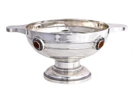 A silver large pedestal quaich by Walker & Hall, Sheffield 1923, with typical lug handles, the