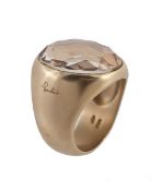 An 18 carat gold and smoky quartz ring by Pomellato, the fancy cut smoky quartz in a collet