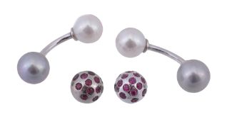 A pair of cultured pearl set cufflinks, the cufflinks with white and grey cultured pearl terminals,