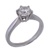 A platinum and diamond single stone ring, the brilliant cut diamond stated to weigh 1.00 carat, in