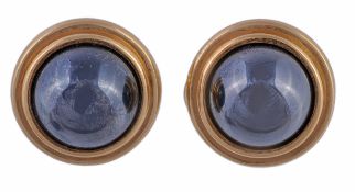 A pair of hematite earrings by Tiffany & Co., the circular cabochon hematite within a polished