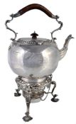 An Edwardian silver spherical kettle on stand by James Wakely & Frank Wheeler, London 1908, with a