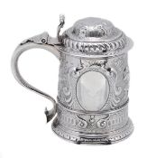 A George II silver straight-tapered tankard by William Darker, London 1732, the double domed cover