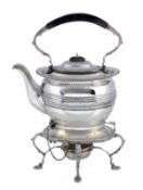 An Irish silver oblong baluster kettle  on stand by T. Weir & Sons, Dublin 1913, with a composition