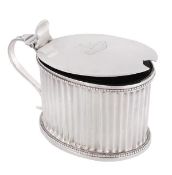 A George III silver fluted mustard pot, no maker`s mark, London 1788, with a slightly domed cover,
