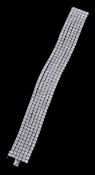 A diamond bracelet, the six articulated rows of brilliant cut diamonds, estimated to weigh 31.80