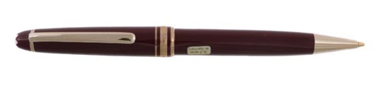 Montblanc, Meisterstuck, a burgundy resin mechanical pencil, with triple cap bands and gilt clip,