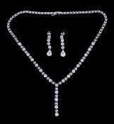 A diamond necklace, composed of articulated circular links set with marquise cut and brilliant cut