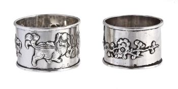 A Chinese export silver matched child`s feeding set and two napkin rings, the spoon by Sing Fat,