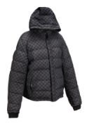 A Louis Vuitton black down filled men`s jacket, with canvas print lining, integral hood, zipped