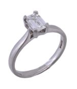 A platinum and diamond single stone ring, the baguette cut diamond, stated to weigh 0.70 carats, in