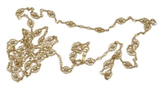 A French gold fancy link necklace,  circa 1846, with pierced scroll links, to a lobster claw clasp,