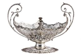 A silver shaped quatrefoil twin handled pedestal basket by Josiah Williams & Co. (George Maudsley