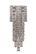 A diamond clip brooch, circa 1950, the pierced geometric brooch set with brilliant cut diamonds,