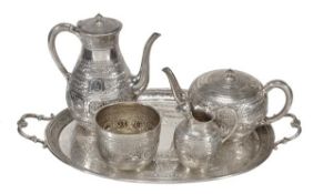 A Victorian silver four piece tea and coffee service and a matched tray, the service with maker`s