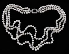 A three stranded cultured pearl necklace by Repossi, each strand composed of seventy nine, eighty