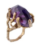 A 1960s amethyst ring by Andrew Grima, the amethyst crystal in a textured abstract claw setting