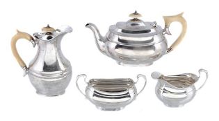 A silver four piece oblong baluster tea service by Viners Ltd, Sheffield 1933, the tea and hotwater