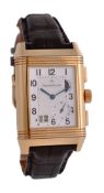 Jaeger LeCoultre, Reverso Grande GMT, a gentleman`s  18 carat gold wristwatch, circa 2000, ref.