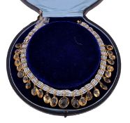 A late 19th century pearl, citrine and gold mounted finger necklace, circa 1870, the four rows of