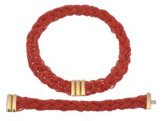 A coral necklace and bracelet, the woven multi row necklace with small tubular coral beads (