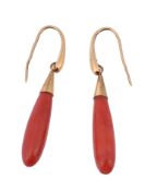 A pair of coral ear pendents, the coral drops with a polished gold coloured surmount, with