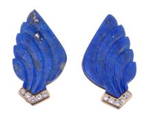 A pair of lapis lazuli and diamond ear clips, the carved wing shaped lapis lazuli with a brilliant