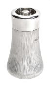 A silver pepper mill by Gerald Benney, London 1986, stamped Gerald Benney London, with a polished