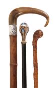 A fine Continental enamelled gilt metal mounted ebonised wood walking stick, early 20th century,